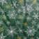 Tela de algodón - Copos de nieve blancos y dorados sobre fondo verde
