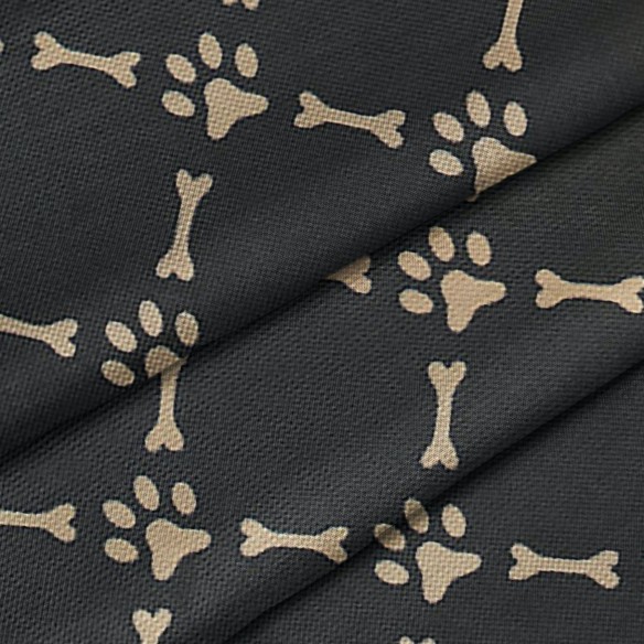 Tela impermeable Oxford - Huesos y patas de perro en negro