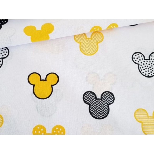 Tela de algodón - Patrones de Mickey Mouse amarillo sobre blanco
